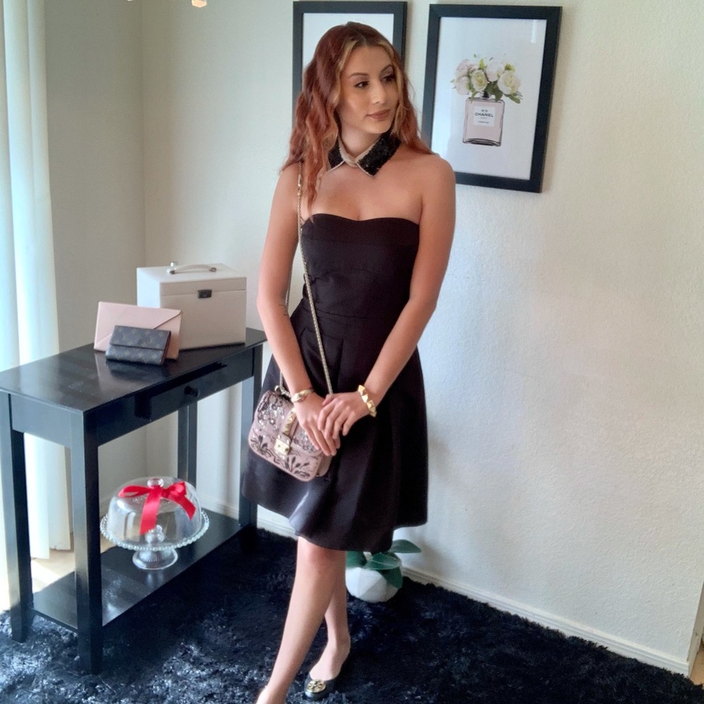 Black strapless pleated dress